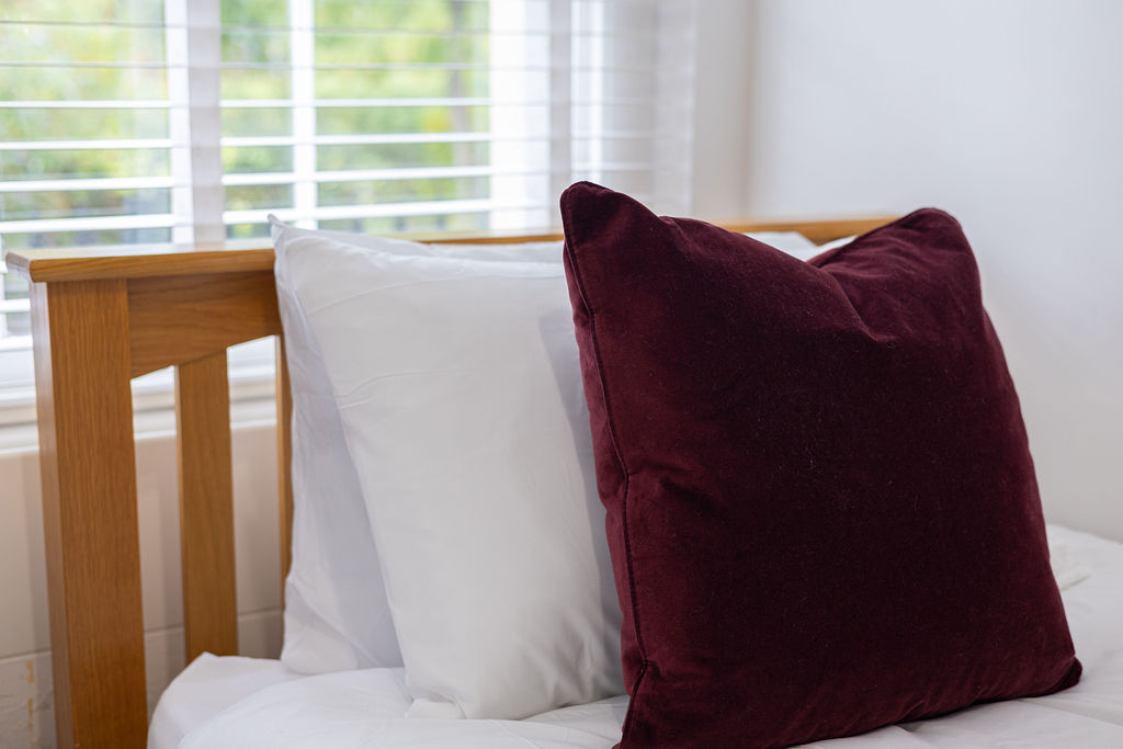 Bedroom pillows in the three bedroom Reading apartment