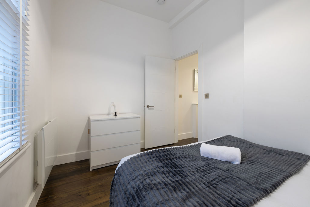 Second bedroom from the foot of the bed in the three bedroom Reading apartment