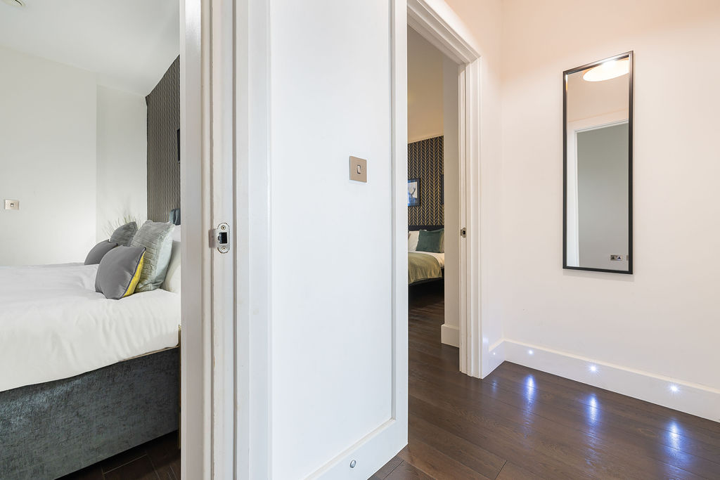 Bedroom doorway and hallway in the two bedroom Reading apartment